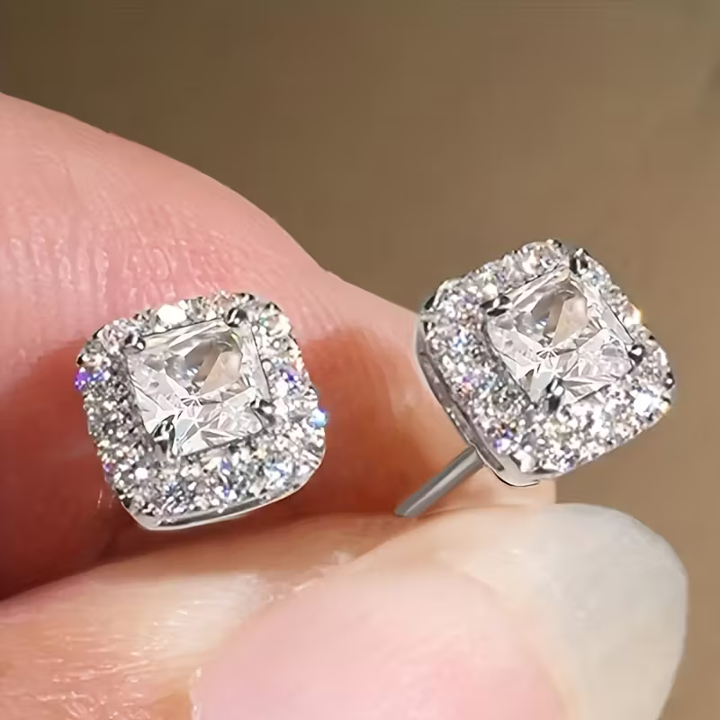 Elegant Gold Emerald Studs